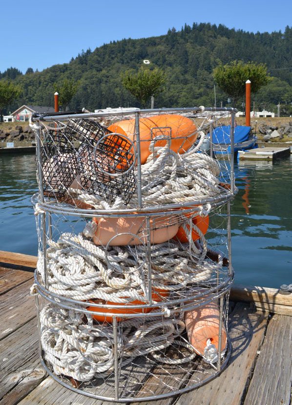 Crabbing equipment on dock overlooking water