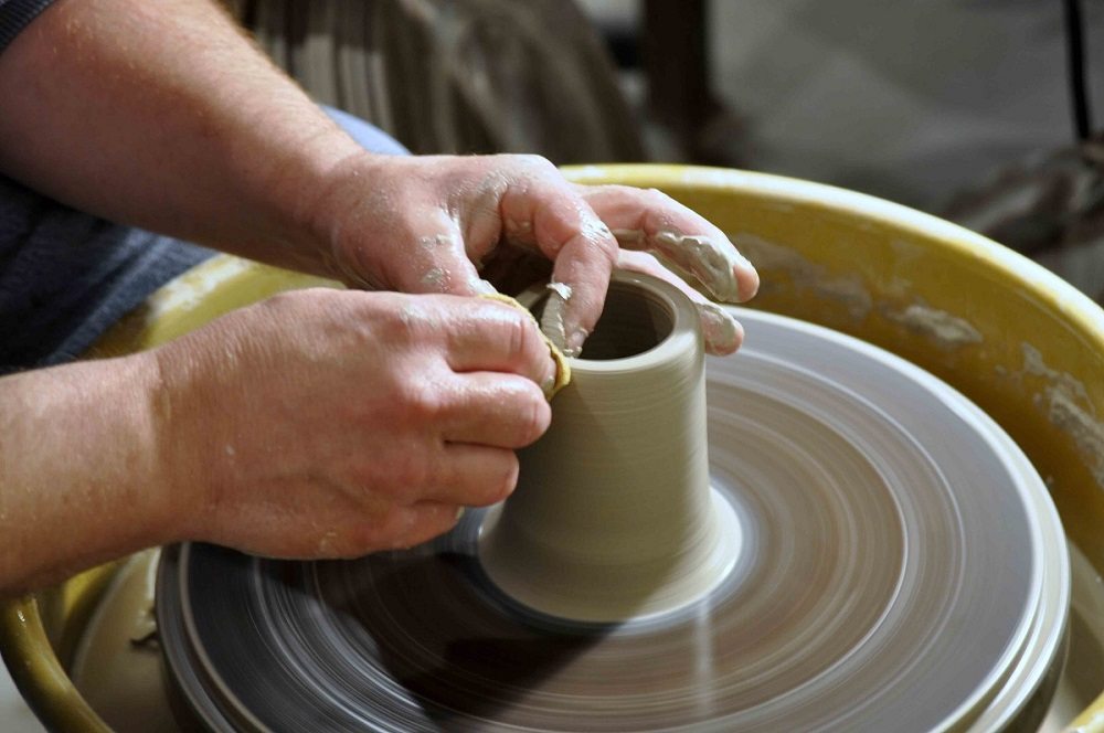 Andy Toth at the potter's wheel