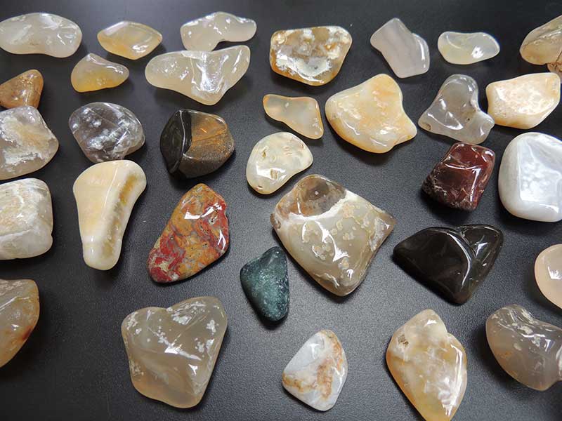 Polished stones on display in Cape Meares