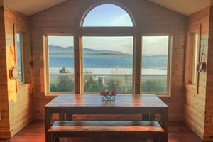 Big windows looking out onto the beach