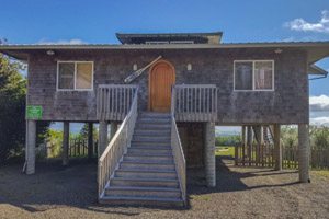Small rental beach house with tall stairs to front door
