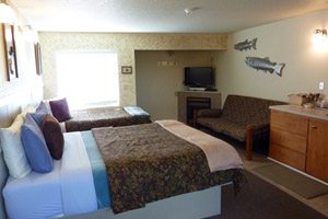 Bedroom interior with fish sculptures on the wall