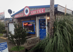 Exterior of coffee shop with blue door