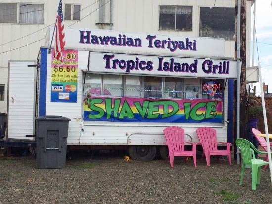 Food cart with signs for Hawaiian teriyaki and shaved ice