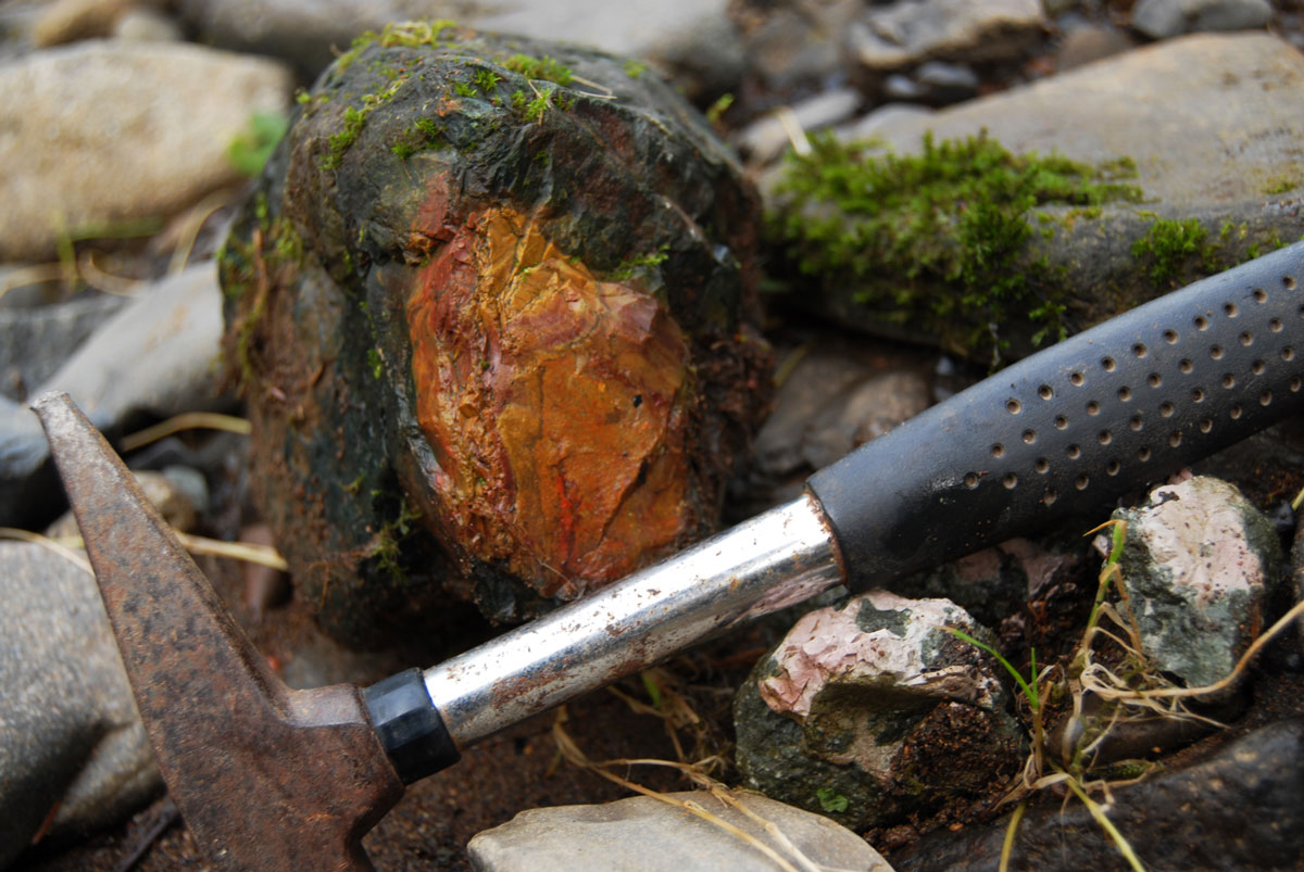 Picking Stone, Manzanita, Tillamook County, Oregon, USA - Stock