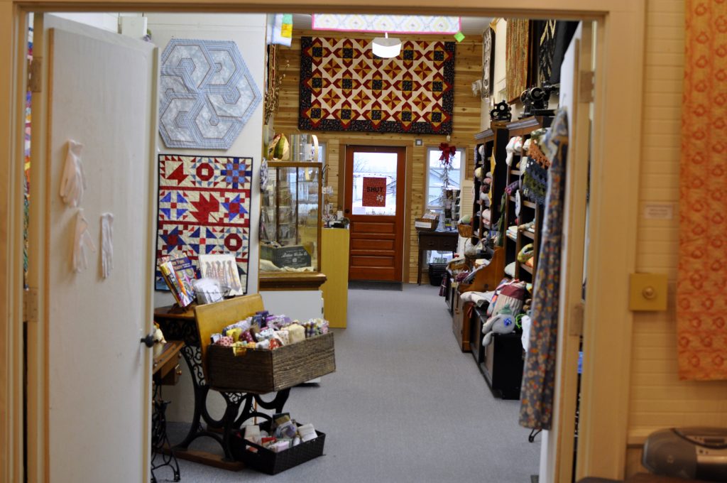 Colorful textiles made by local artisans are for sale at the Latimer Quilt and Textile Center