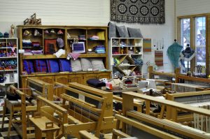 Weavers gather weekly to work the heirloom looms at the Latimer Quilt and Textile Center. JPG