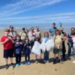 Cub Scout Pack 122 cleans up the beach