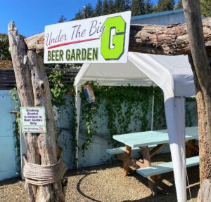 under the big G beer garden sign tent