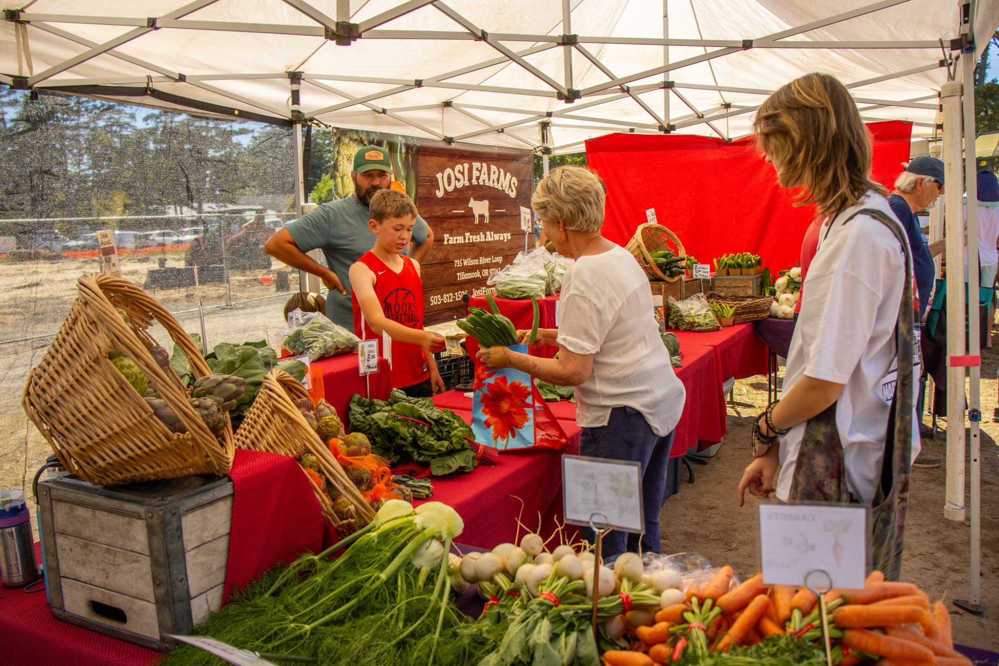 Manzanita Farmers Market vegatables tent shoppers