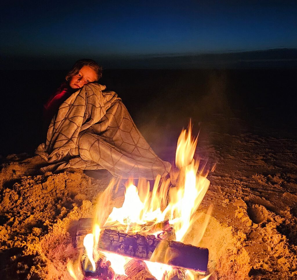 beach fire night child blanket