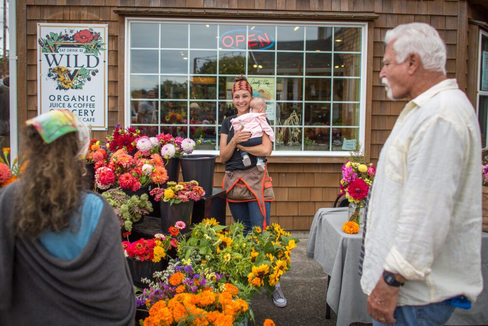 flower shop store front sidewalk people